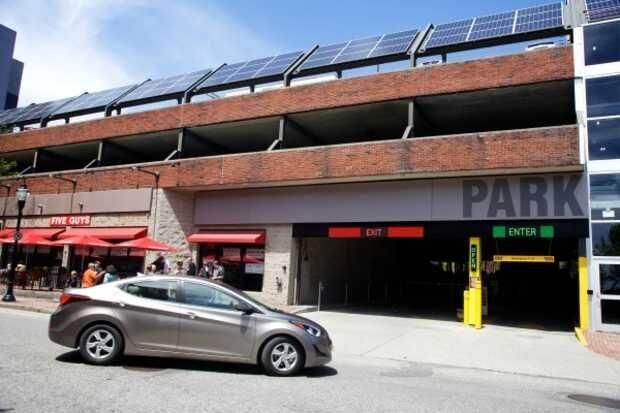 Tesla Parked Outside Of Portland, Maine's Solar Powered Garage On Fore Street