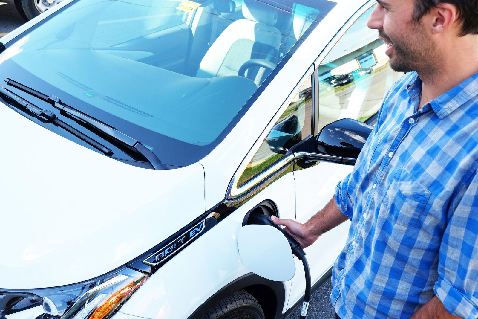 revision energy customer charging their electric vehicle