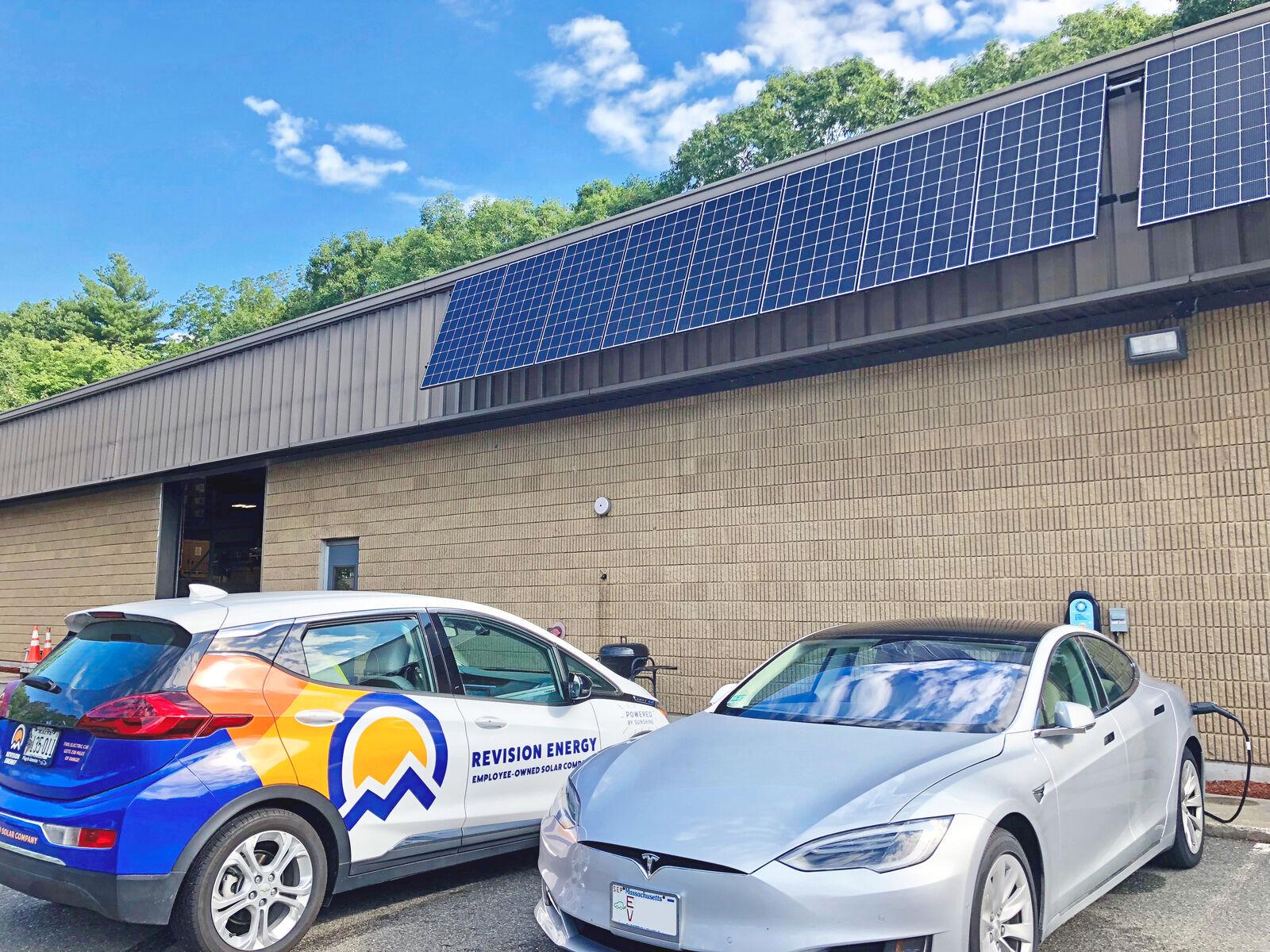 ev cars charging outside revision energy office