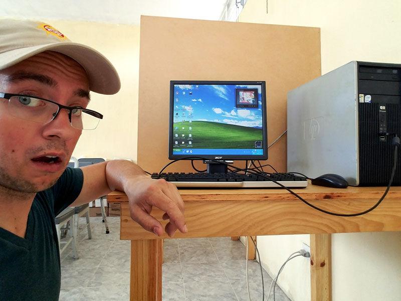 Justin Fixes PC In Hot Classroom